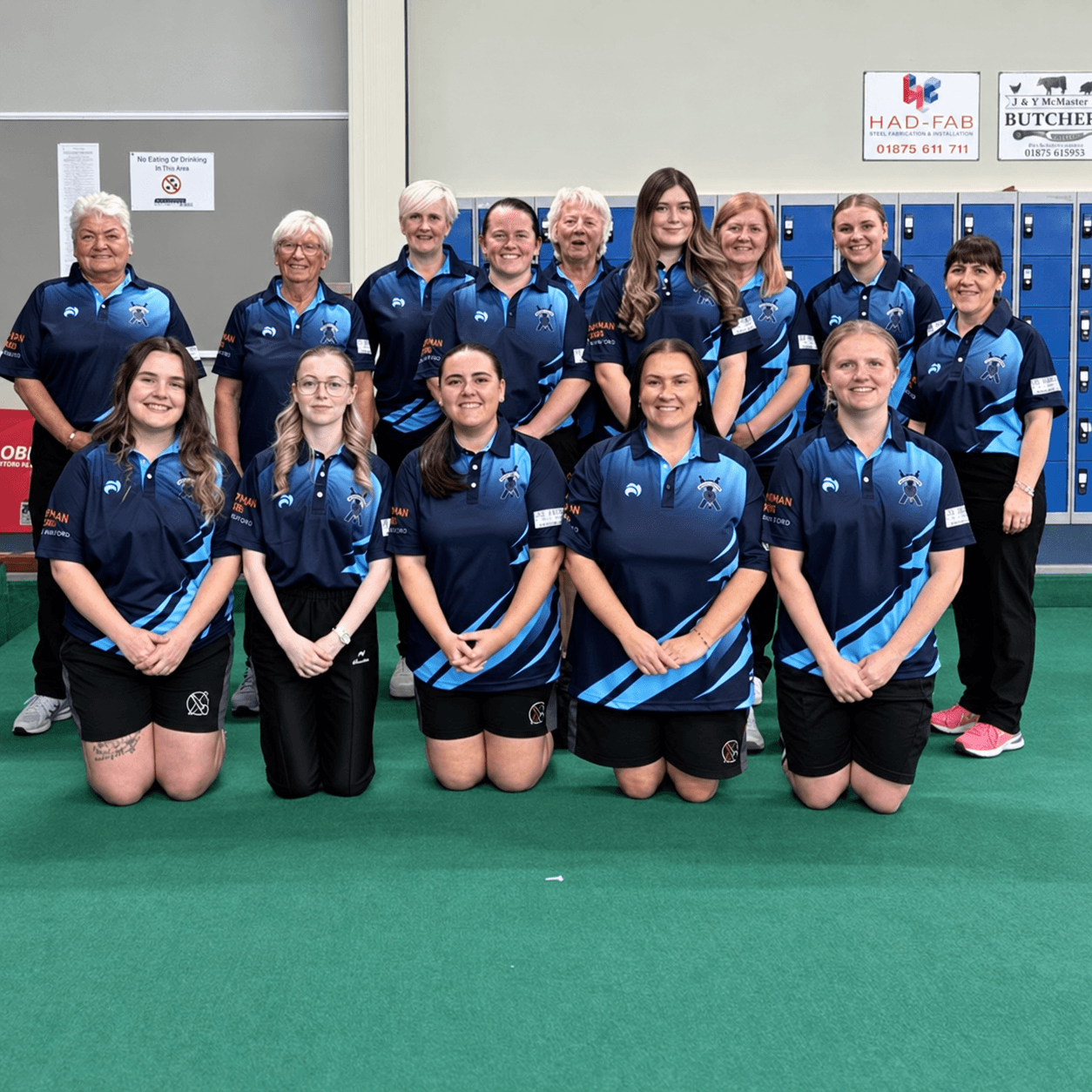 Midlothian Indoor Bowling Club team in their navy and blue sponsored strips
