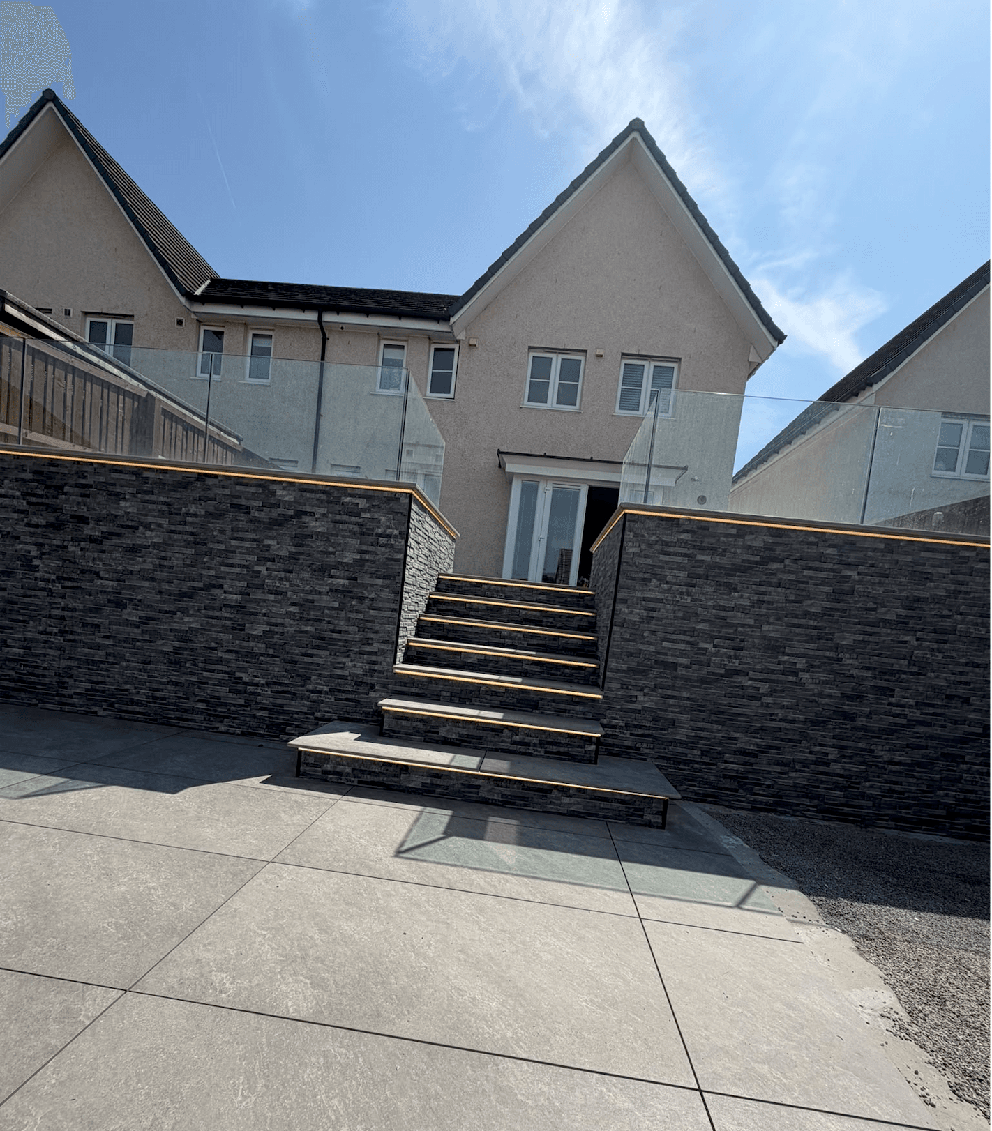 Outdoor LED strip lighting installed on stone walls and steps at a residential property in Edinburgh